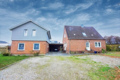 Zwei Einfamilienhäuser mit Carport inkl. Abstellraum 