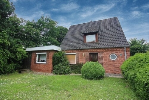 Einfamilienhaus in zentraler Lage von Süderlügum mit Nebengebäuden