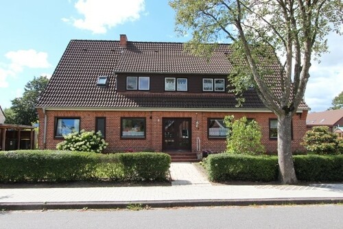 Gemütliche vermietete 2-Zimmer-Eigentumswohnung mit Garten und Carport in schöner Lage