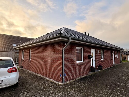 Doppelhaushälfte auf einer Ebene - Vermietetes Anlageobjekt mit Garten